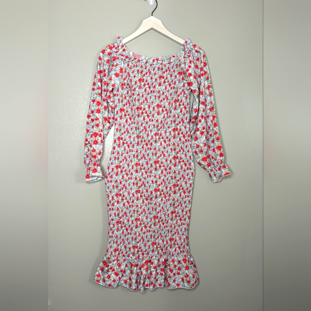 Beautiful Midi floral bodycon long sleeve dress. NWT stretchy, true to size.